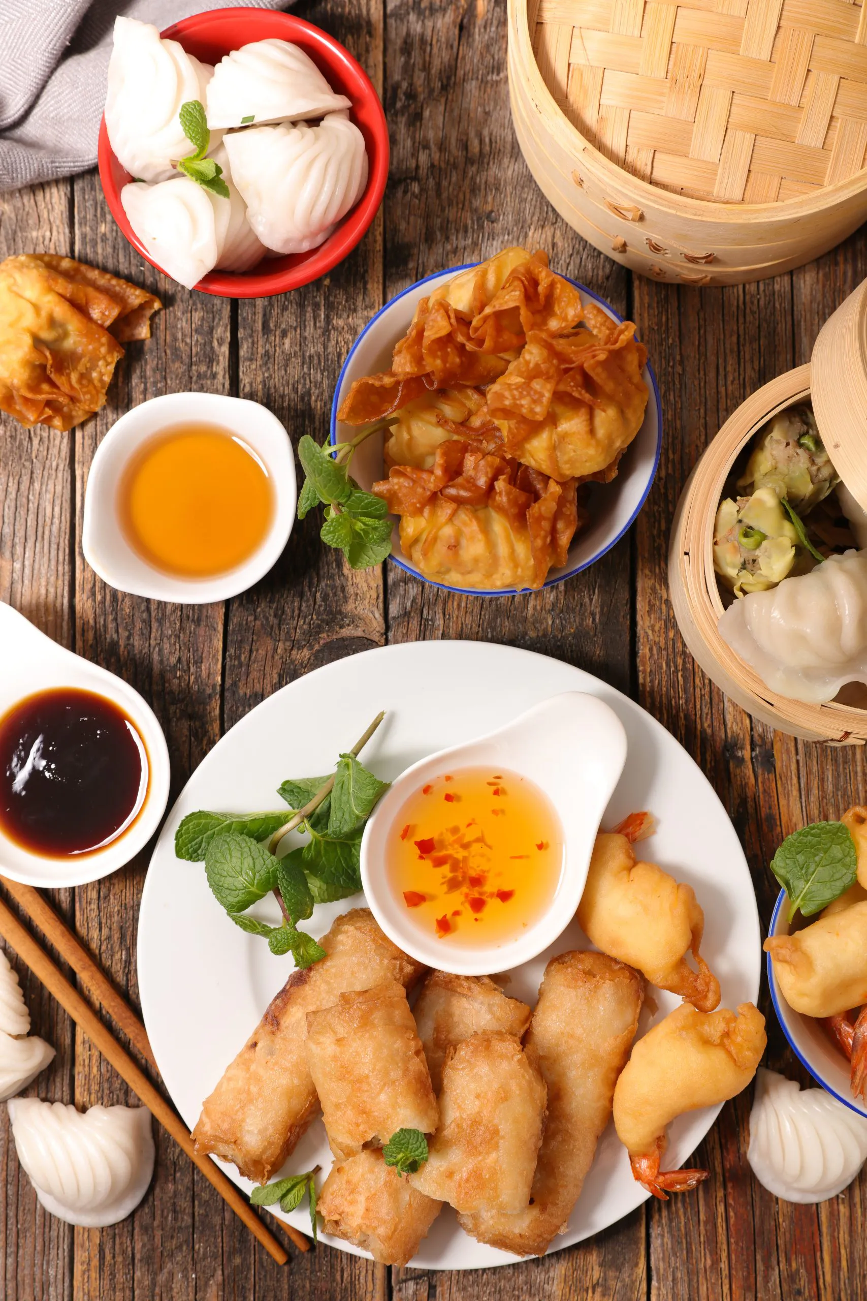 Assorted dim sum including har gow, spring rolls, and fried wantons at Happy Oriental Cafe, a Chinese Restaurant in Longview