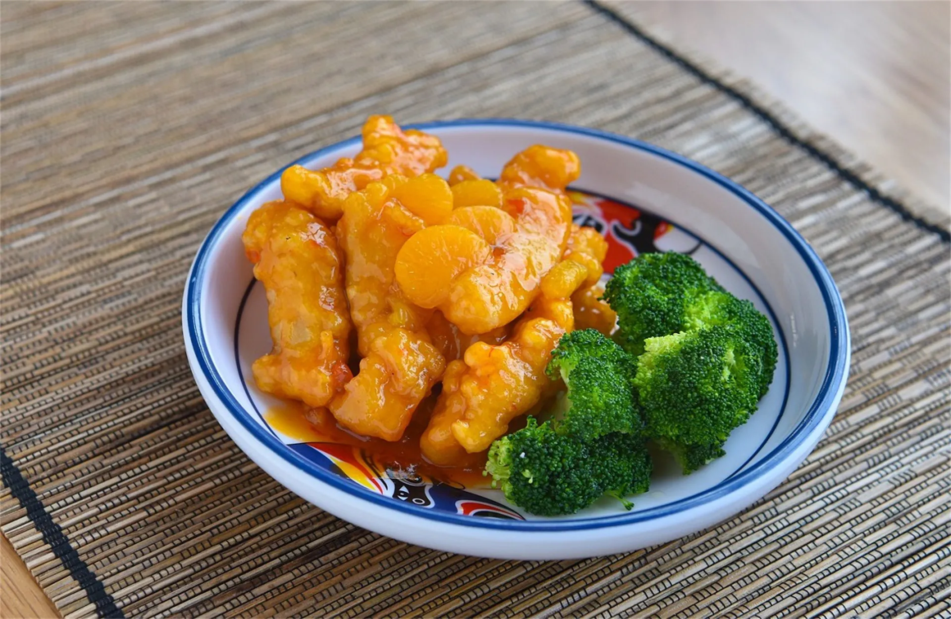 Orange chicken with mandarin oranges and broccoli at Happy Oriental Cafe, a Chinese Restaurant in Longview